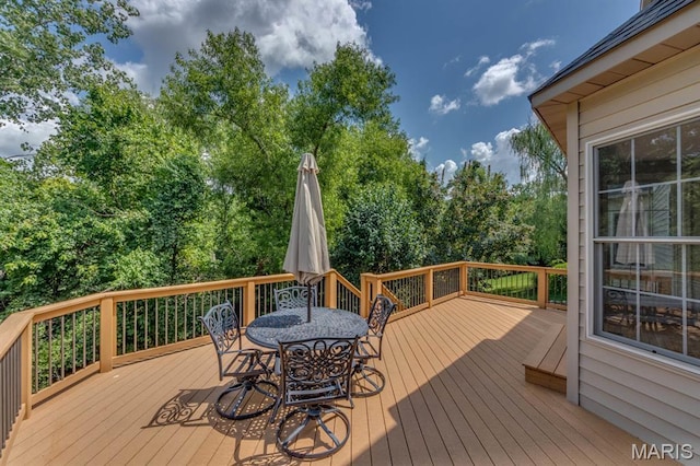1515 Dietrich Glen Dr, Ballwin, MO 63021 - deck with outdoor dining area and view of scattered trees
