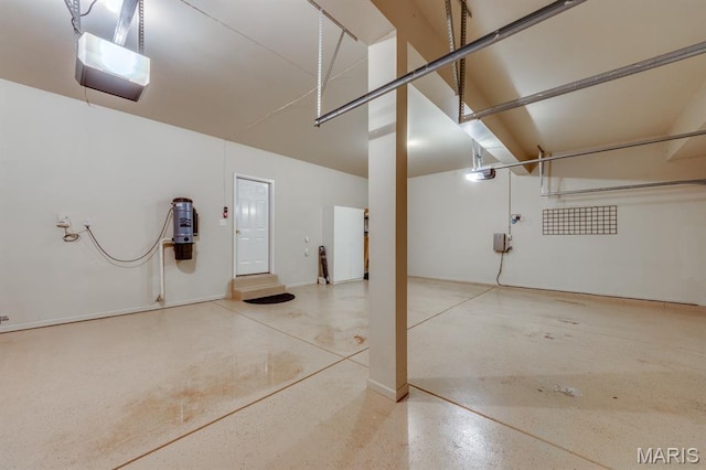 1515 Dietrich Glen Dr, Ballwin, MO 63021 - garage featuring a central vacuum unit and a garage door opener