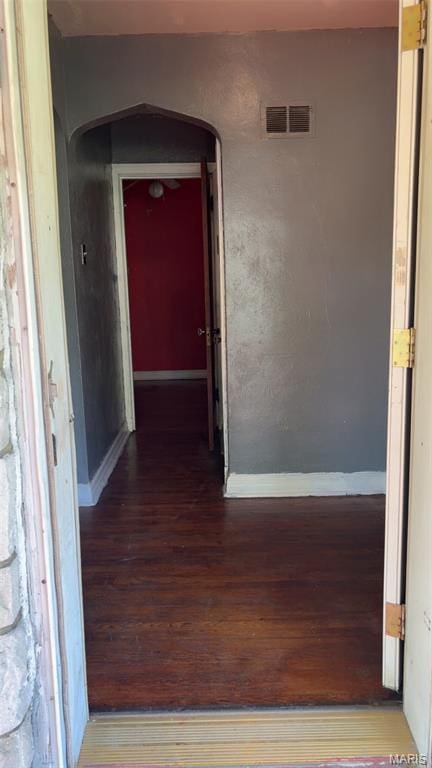 1178 Riverview Blvd, Saint Louis, MO 63147 - corridor with arched walkways and wood finished floors