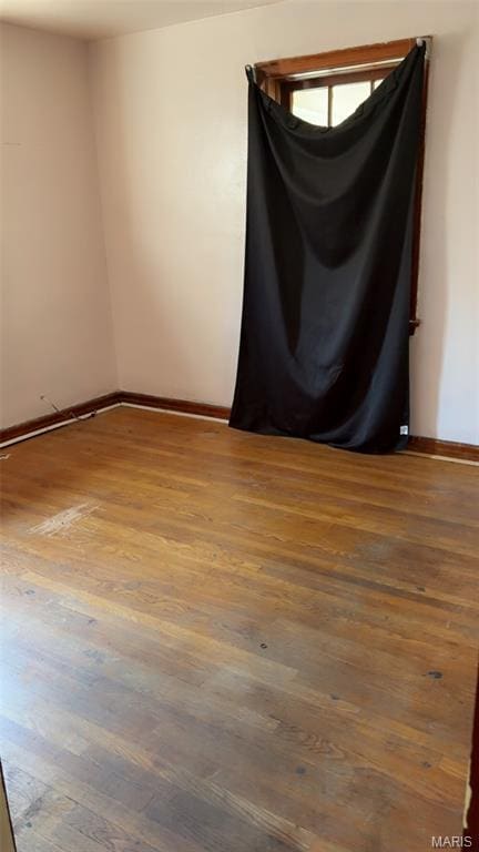 1178 Riverview Blvd, Saint Louis, MO 63147 - empty room featuring wood finished floors and baseboards