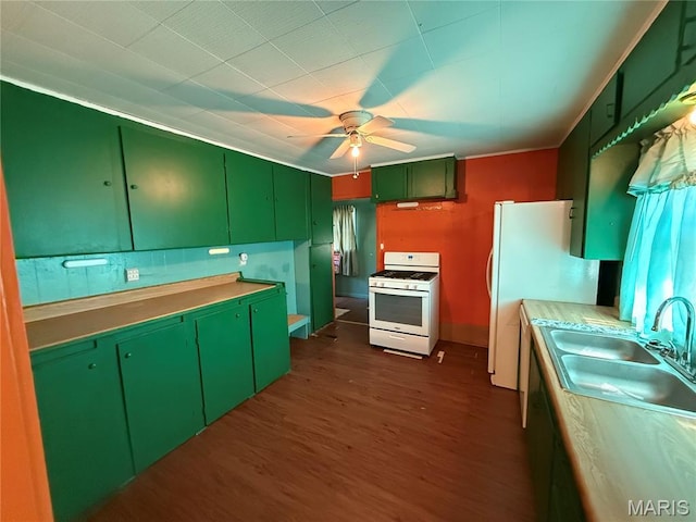 169 Grand Ave, Lebanon, MO 65536 - kitchen featuring white appliances, green cabinets, a ceiling fan, and dark wood finished floors