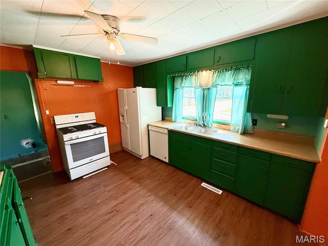 169 Grand Ave, Lebanon, MO 65536 - kitchen with green cabinetry, white appliances, dark wood-style floors, ceiling fan, and light countertops
