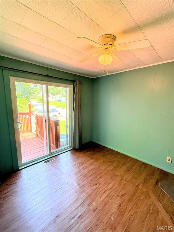 169 Grand Ave, Lebanon, MO 65536 - empty room featuring ceiling fan and wood finished floors