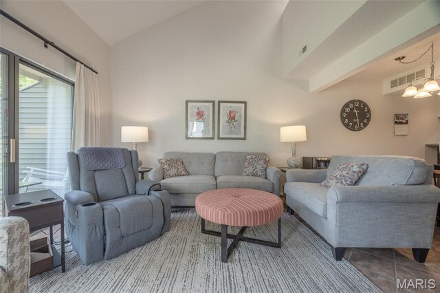 15 Lionshead Ridge Dr Unit 15, Innsbrook, MO 63390 - living area with vaulted ceiling and a chandelier