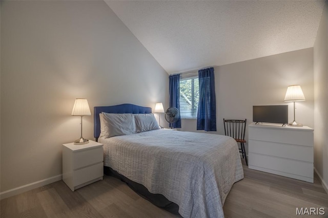 15 Lionshead Ridge Dr Unit 15, Innsbrook, MO 63390 - bedroom with lofted ceiling and wood finished floors