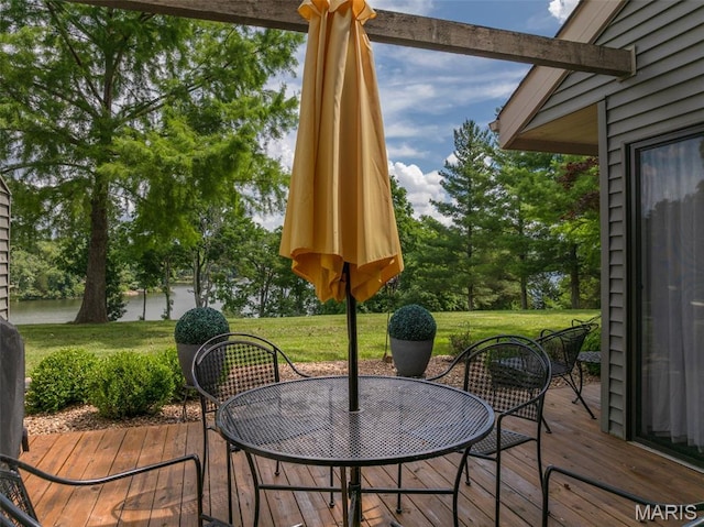 15 Lionshead Ridge Dr Unit 15, Innsbrook, MO 63390 - view of patio featuring a wooden deck, view of wooded area, and outdoor dining space