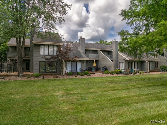 15 Lionshead Ridge Dr Unit 15, Innsbrook, MO 63390 - back of house with a lawn and a chimney