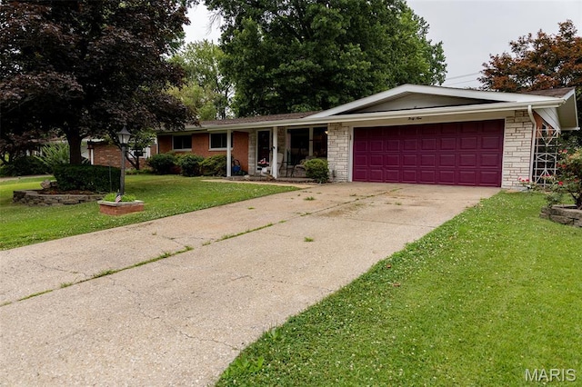 49 Bedford Dr, Belleville, IL 62226 - single story home with a garage, a front yard, concrete driveway, and a porch