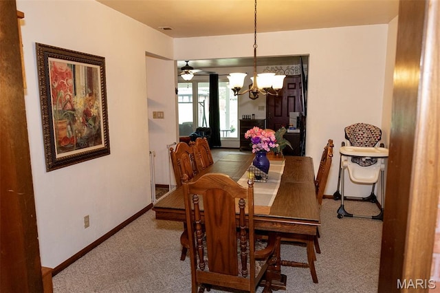 49 Bedford Dr, Belleville, IL 62226 - dining space with carpet flooring and a chandelier