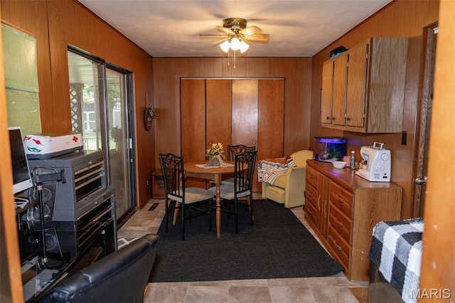 49 Bedford Dr, Belleville, IL 62226 - dining room featuring wood walls and a ceiling fan
