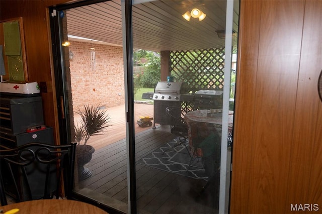 49 Bedford Dr, Belleville, IL 62226 - entryway with hardwood / wood-style flooring and brick wall