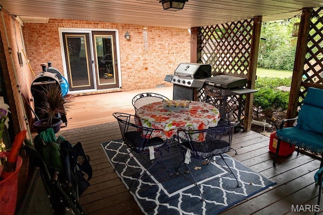 49 Bedford Dr, Belleville, IL 62226 - wooden terrace featuring outdoor dining space and area for grilling