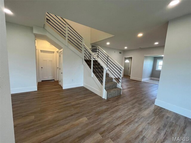 302 State St, Scott City, MO 63780 - stairway with wood finished floors and recessed lighting