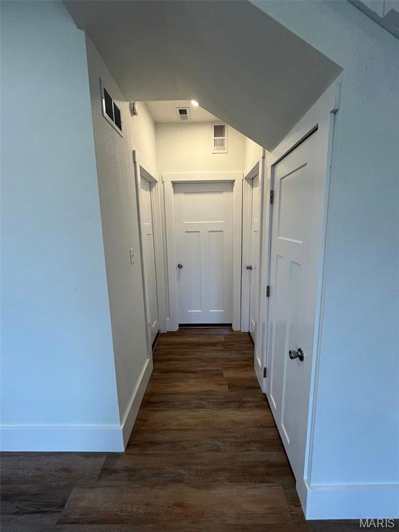 302 State St, Scott City, MO 63780 - hall featuring dark wood finished floors and baseboards