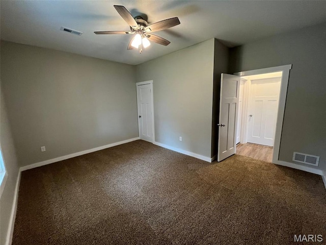 302 State St, Scott City, MO 63780 - unfurnished bedroom featuring carpet and a ceiling fan