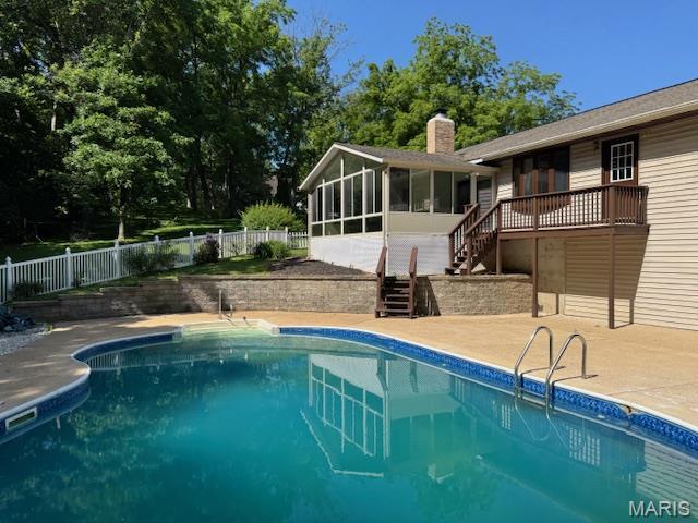 7 Forest Hills Dr, Washington, MO 63090 - view of pool featuring stairway, a sunroom, a fenced backyard, and a patio