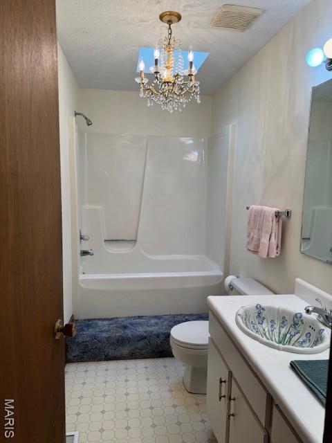 7 Forest Hills Dr, Washington, MO 63090 - full bath featuring vanity, washtub / shower combination, tile patterned floors, and a chandelier