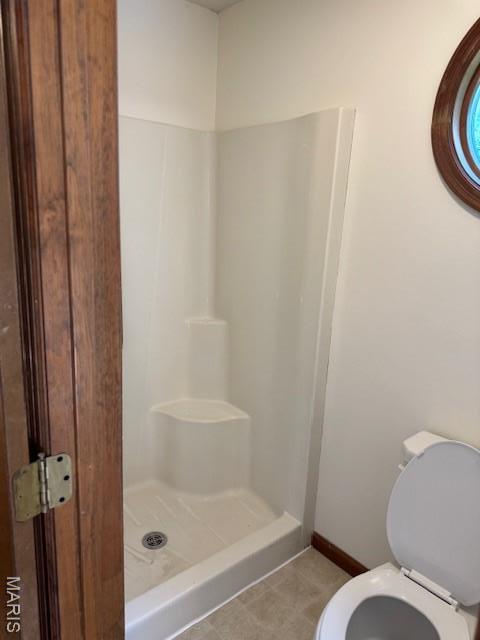 7 Forest Hills Dr, Washington, MO 63090 - bathroom with a stall shower and tile patterned floors