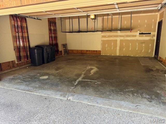 7 Forest Hills Dr, Washington, MO 63090 - garage featuring a garage door opener