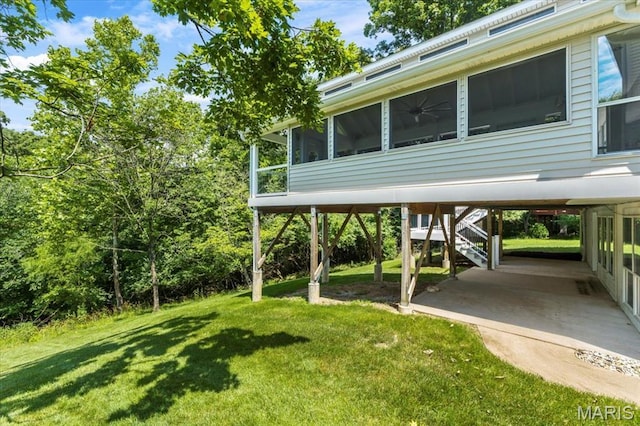 510 Wetherby Terrace Dr, Ballwin, MO 63021 - view of green lawn featuring stairway and a sunroom