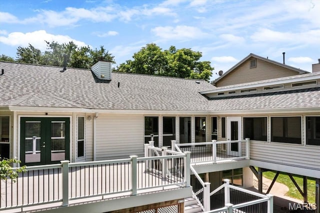 510 Wetherby Terrace Dr, Ballwin, MO 63021 - rear view of house featuring roof with shingles, french doors, a chimney, and a deck