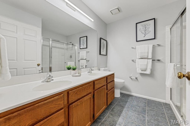 510 Wetherby Terrace Dr, Ballwin, MO 63021 - bathroom featuring a stall shower, double vanity, and tile patterned floors