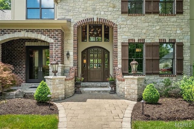 21 Lynnbrook Rd, Saint Louis, MO 63131 - doorway to property featuring french doors and stone siding
