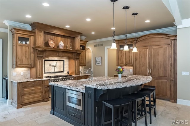 21 Lynnbrook Rd, Saint Louis, MO 63131 - kitchen with stainless steel stove, crown molding, brown cabinets, recessed lighting, and backsplash