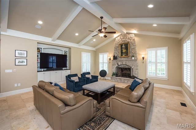 21 Lynnbrook Rd, Saint Louis, MO 63131 - living room with a fireplace, a ceiling fan, healthy amount of natural light, recessed lighting, and light stone finish flooring