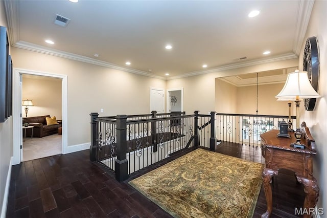 21 Lynnbrook Rd, Saint Louis, MO 63131 - hall featuring an upstairs landing, wood finished floors, crown molding, and recessed lighting