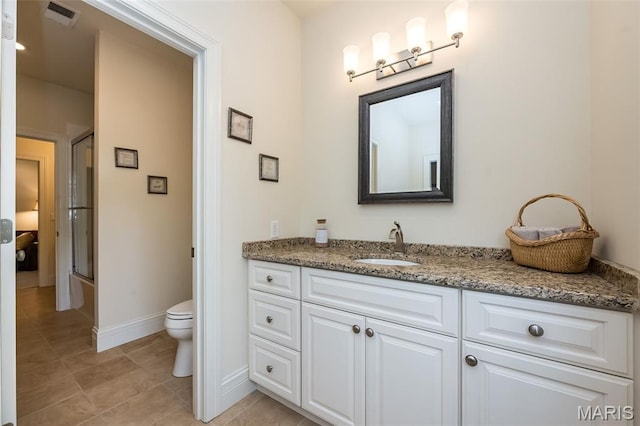 21 Lynnbrook Rd, Saint Louis, MO 63131 - bathroom featuring vanity, a shower with shower door, and tile patterned flooring