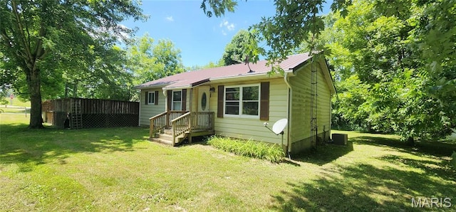 8739 Shawneetown Trl, Chester, IL 62233 - view of front of house featuring a front lawn, a metal roof, and a deck