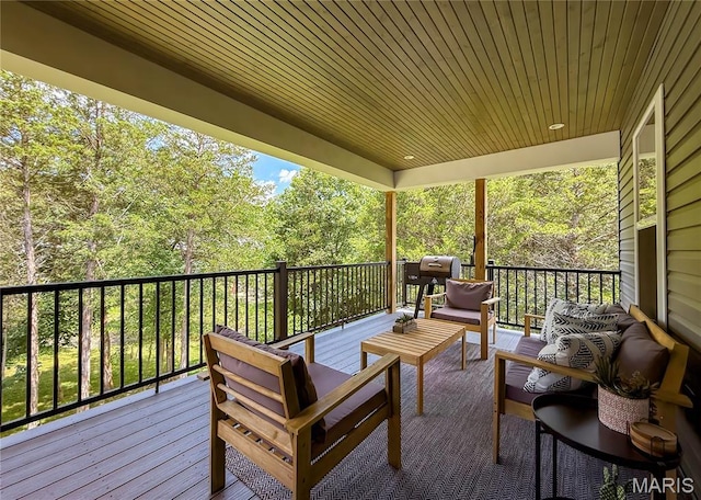 358 N Thomas St, De Soto, MO 63020 - wooden terrace with outdoor lounge area