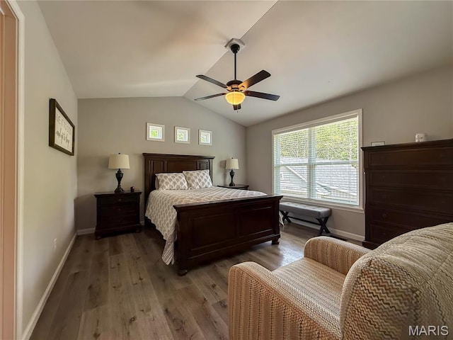 358 N Thomas St, De Soto, MO 63020 - bedroom with vaulted ceiling, wood finished floors, and a ceiling fan