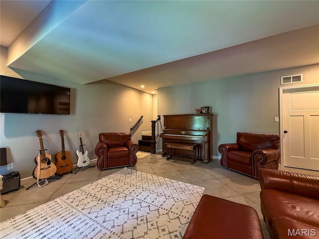 358 N Thomas St, De Soto, MO 63020 - living room with light tile patterned floors and baseboards