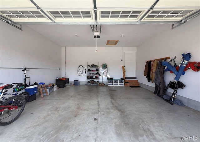 358 N Thomas St, De Soto, MO 63020 - garage featuring a garage door opener