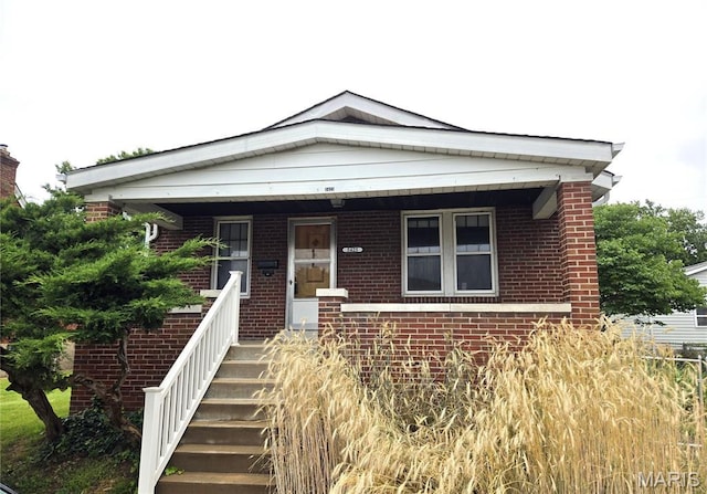 5425 Sunshine, Saint Louis, MO 63109 - view of front facade featuring brick siding and covered porch