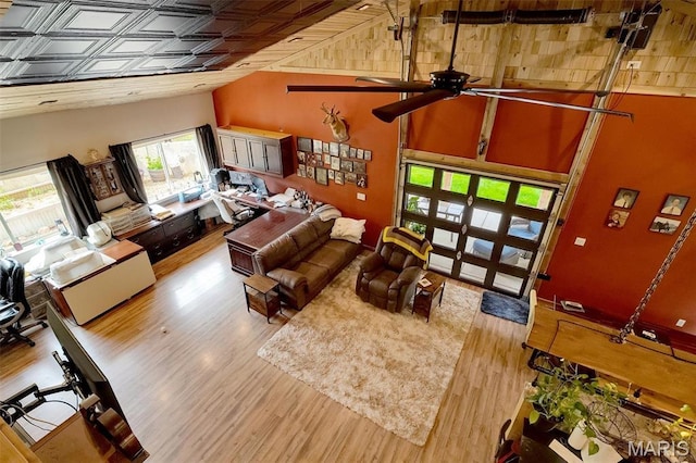 3204 Westwood Rd, Saint Clair, MO 63077 - living area featuring wood finished floors, ceiling fan, and high vaulted ceiling