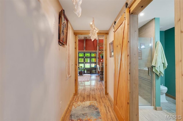3204 Westwood Rd, Saint Clair, MO 63077 - hall with light wood-style floors and a barn door
