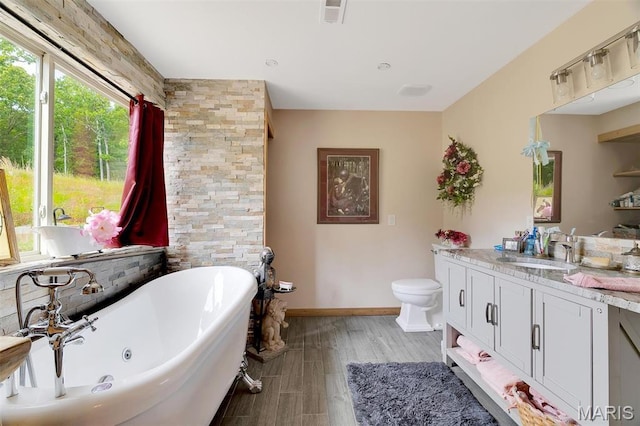 3204 Westwood Rd, Saint Clair, MO 63077 - full bath featuring a soaking tub, vanity, and wood finished floors