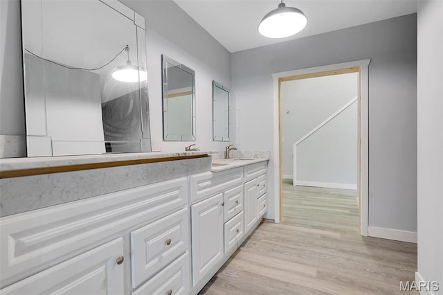 3080 Westwood Rd, Saint Clair, MO 63077 - bathroom with double vanity and wood finished floors