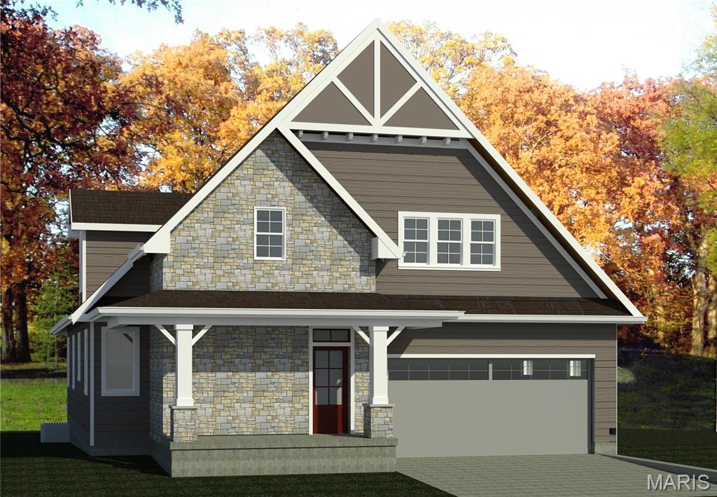 506-TBB Coverdale Ln, St George, MO 63122 - view of front of property with stone siding, concrete driveway, covered porch, and a garage