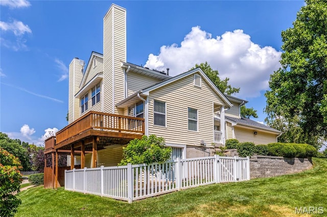 1905 King Arthur Ct, Maryland Heights Township, MO 63146 - back of house featuring a chimney and a deck
