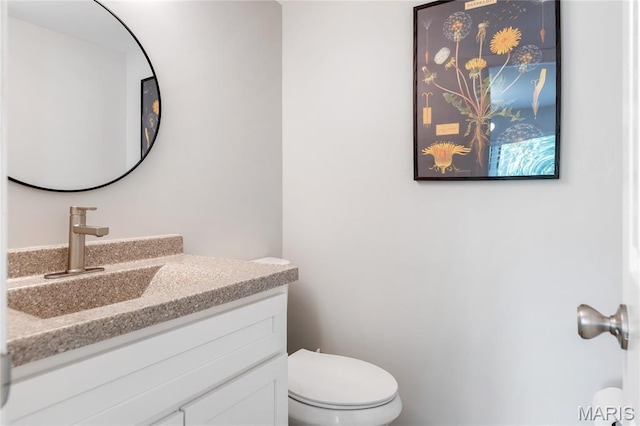 1905 King Arthur Ct, Maryland Heights Township, MO 63146 - bathroom featuring toilet and vanity
