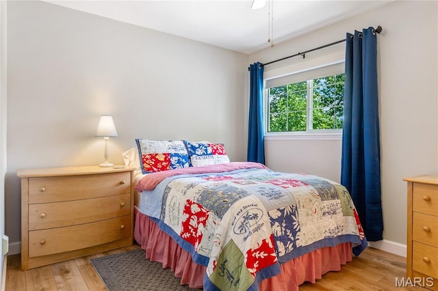1905 King Arthur Ct, Maryland Heights Township, MO 63146 - bedroom featuring light wood finished floors and a ceiling fan