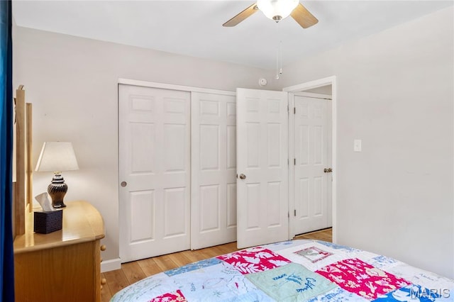 1905 King Arthur Ct, Maryland Heights Township, MO 63146 - bedroom with light wood-style flooring, a closet, and ceiling fan