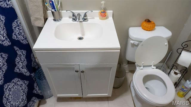 6401 Margaret, Saint Louis, MO 63121 - bathroom with vanity, tile patterned floors, and a shower with curtain