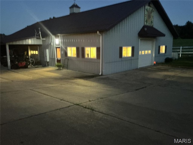 11996 County Road 3290, Rolla, MO 65401 - view of front facade featuring driveway and a garage