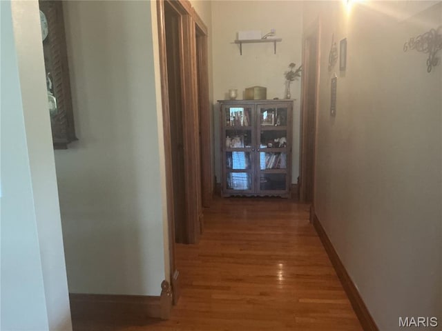 11996 County Road 3290, Rolla, MO 65401 - hall with wood finished floors and baseboards