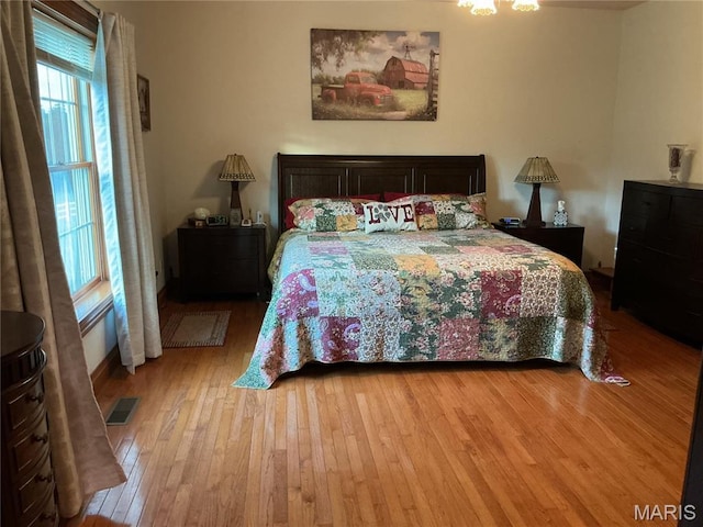 11996 County Road 3290, Rolla, MO 65401 - bedroom with light wood-style floors